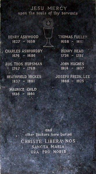 Memorial stone to former Rectors in the Chancel floor. The Latin translates as "Christ, set us free. Holy Mary, pray for us."