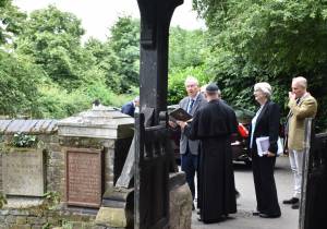 The Duke of Gloucester signs the Visitors' Book, standing on almost the same spot as his Grandmother Queen Mary when she visited in the 1930s.